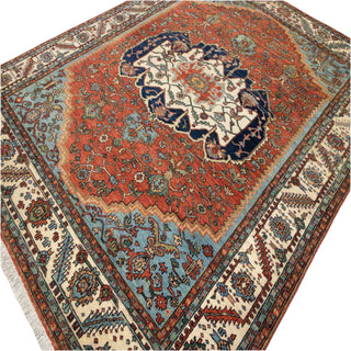 Decorative rug with intricate patterns on a light-colored floor